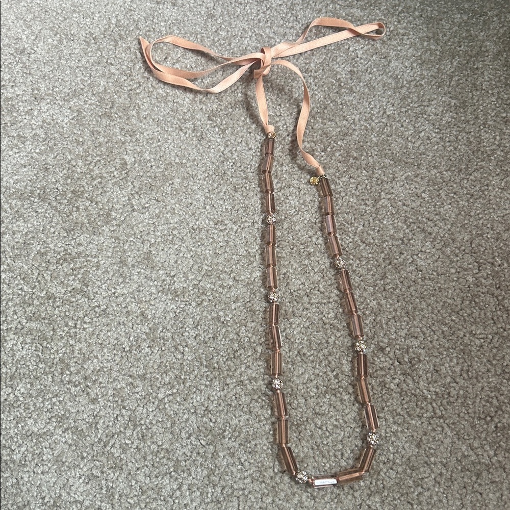 J Crew decorative necklace with Peach barrel bead and rhinestone circles